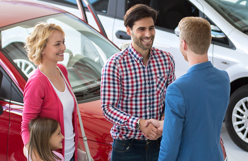Customers trading their car in for a new Nissan in Medina, OH