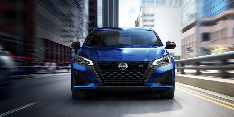 A 2024 Nissan Altima that is driving fast with speed lines in Medina, OH