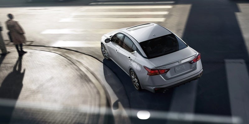 A 2024 Nissan Altima taking a turn in Medina, OH