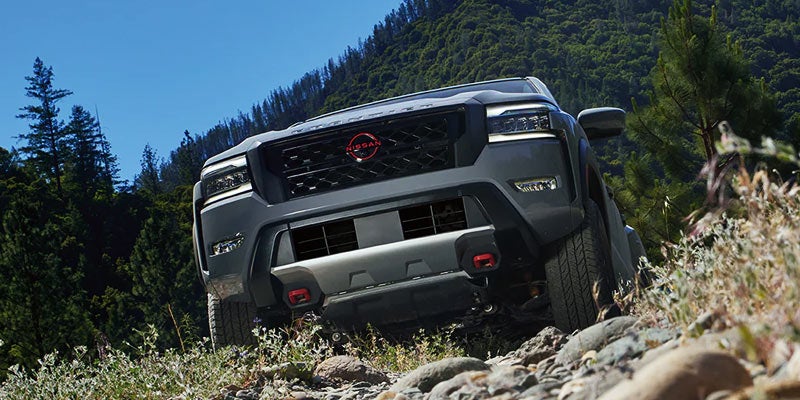 The front grille on a 2024 Nissan Frontier trim option in Medina, OH
