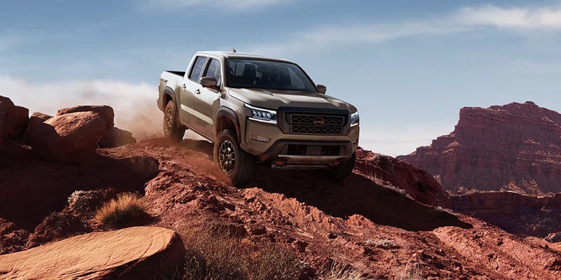 A 2024 Nissan Frontier traversing a mountain in Medina, OH