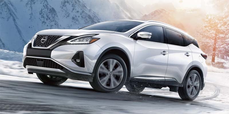 A 2024 Nissan Murano driving on a snowy road near Medina, OH