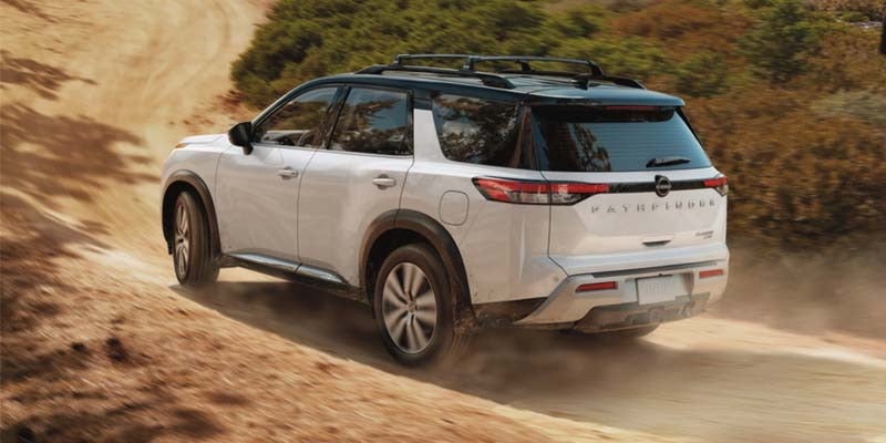 A 2024 Nissan Pathfinder that is driving on a dusty road near Medina, OH