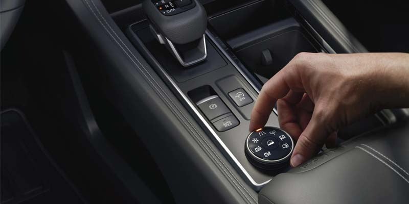 A safety feature dial adjustment on the 2024 Nissan Pathfinder in Medina, OH