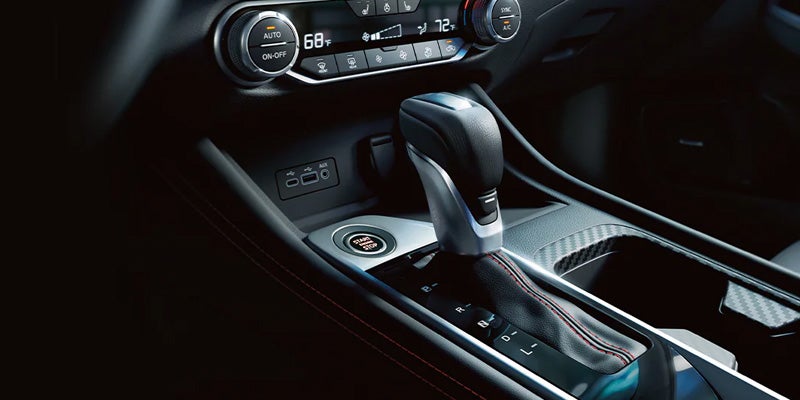 The center console full of safety features in the 2024 Nissan Sentra in Medina, OH