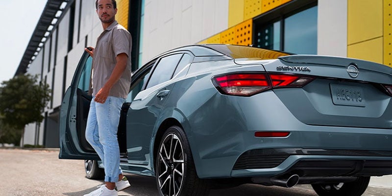 A man stepping out of a 2025 Nissan Sentra in Medina, OH